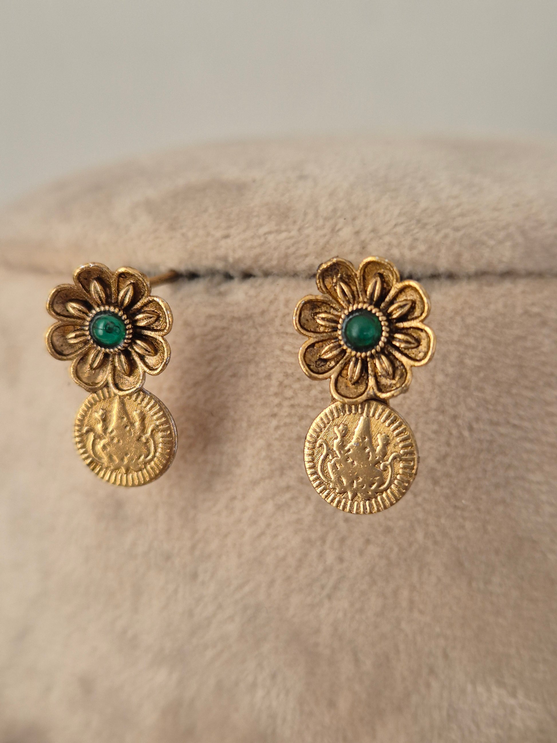Pair of antique gold coin drop earrings with green stone floral tops matching the Zoyna Necklace Set