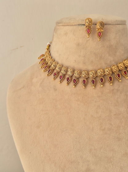 Antique gold choker necklace with teardrop ruby-pink stone pendants and small stud earrings