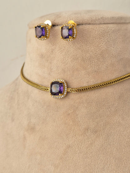 Antique gold-plated long black bead mangalsutra set with ruby-pink stone floral pendant and coordinating earrings