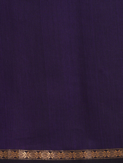 Bright cobalt blue and purple saree draped neatly to highlight delicate handwoven pattern and fabric texture