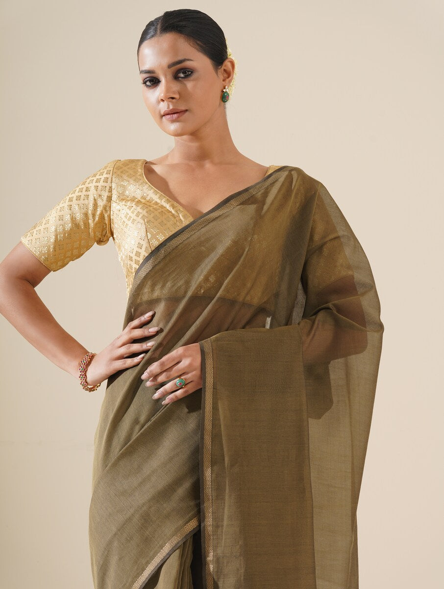 Khaki saree featuring kosa pallu handwoven in fine cotton silk, showcased on a neutral background