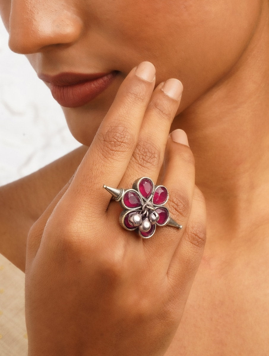 Silver-tone adjustable ring with red accents and textured finish