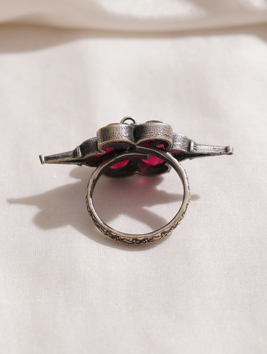 Silver-tone adjustable ring with red accents and textured finish