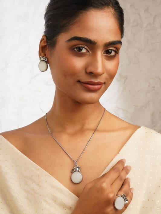 Silver necklace set with matching earrings and ring, Seema by Naitri.