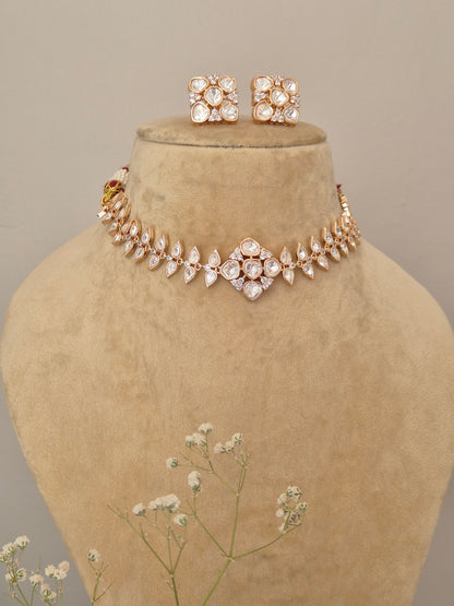 Handcrafted geometric AD necklace set with floral center stone and matching studs by naitri.in