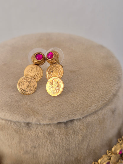 Gold-toned ethnic maching earrings with red stones by Naitri.in