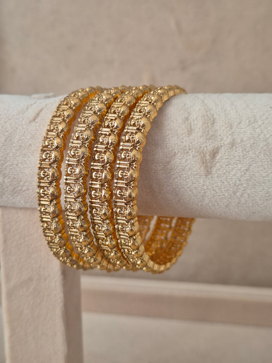 Aaravi Bangles set of 4, traditional Indian gold-plated bangles, ethnic festive and bridal jewelry collection by Naitri.in