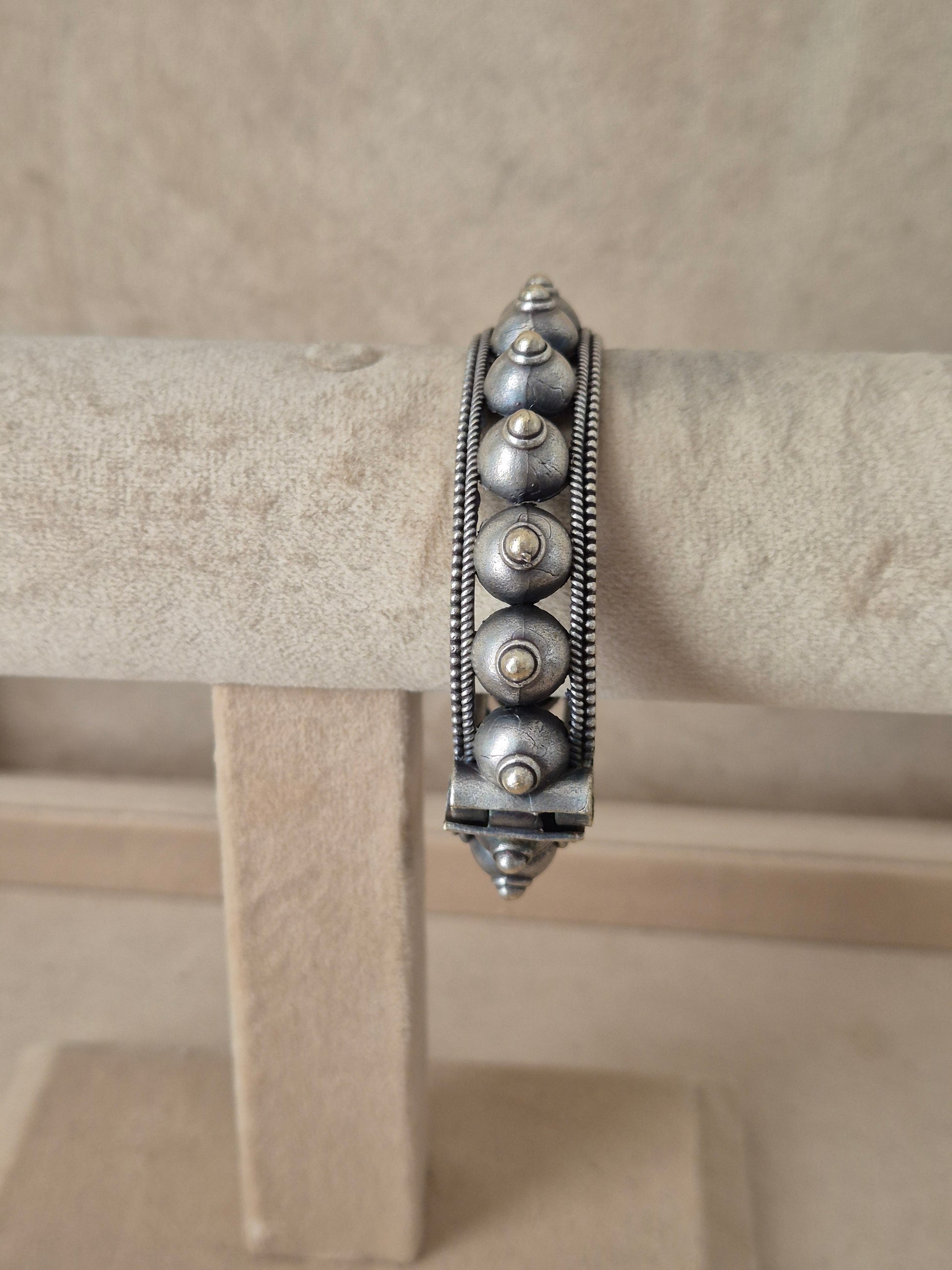 Premium oxidized silver bangle with detailed traditional metalwork by naitri.in