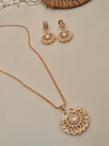 Elegant handcrafted American Diamond necklace and earring set on a display stand, ideal for weddings and special occasions by naitri.in