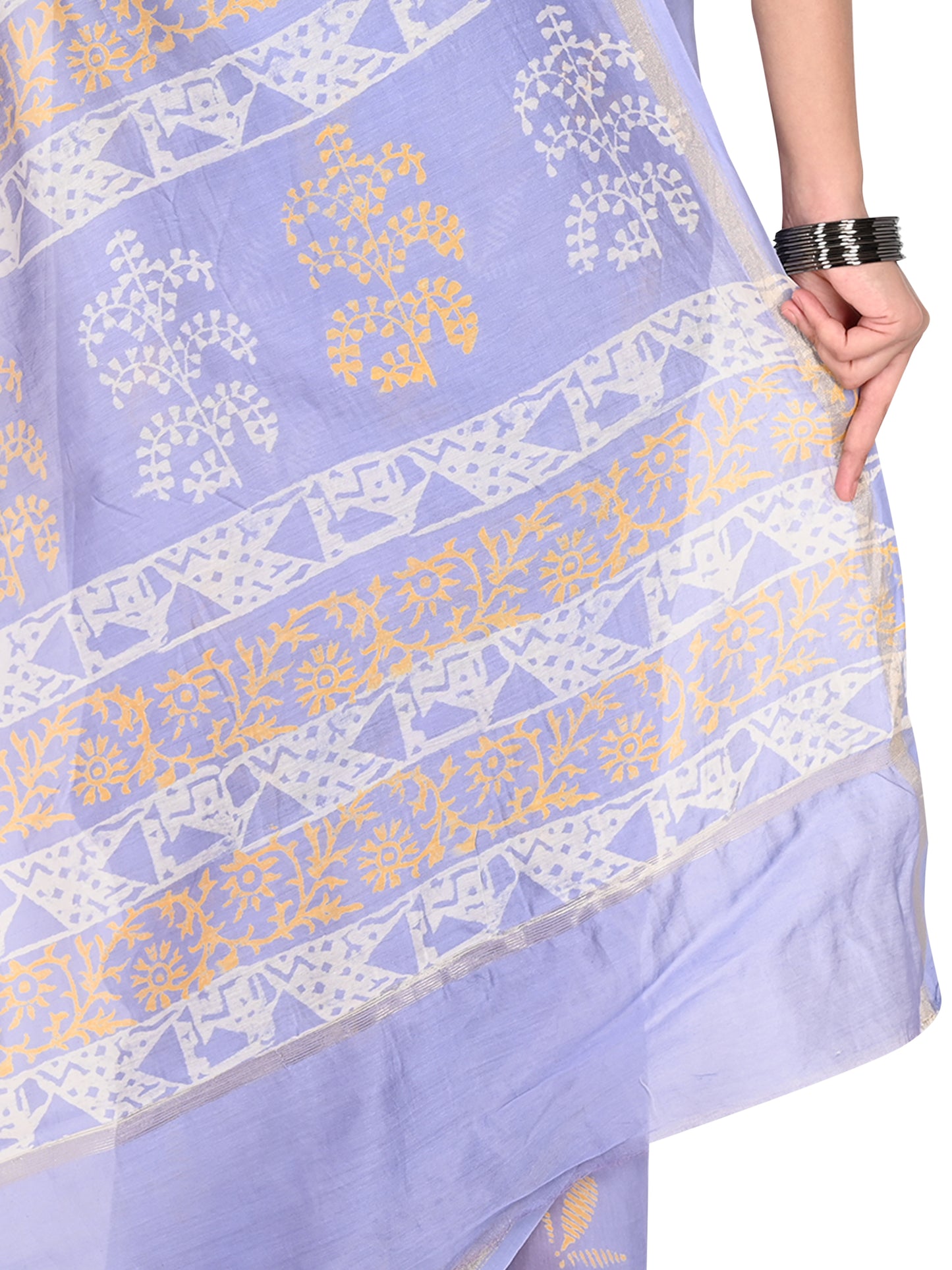 Close-up of the Amira saree's lavender cotton-silk fabric, showcasing the subtle silk sheen and intricate white geometric and floral hand-block print pallu by naitri.in