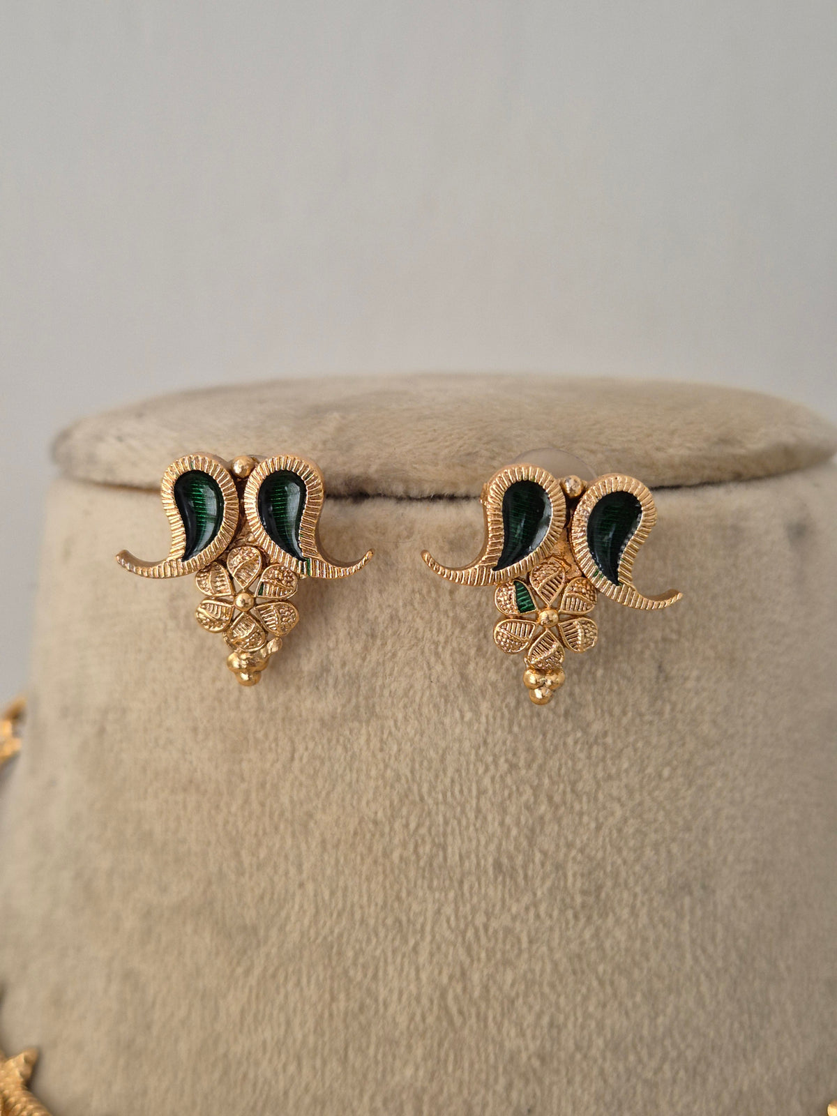 Traditional Indian ethnic gold and black bead necklace set with gemstone details by Naitri.in