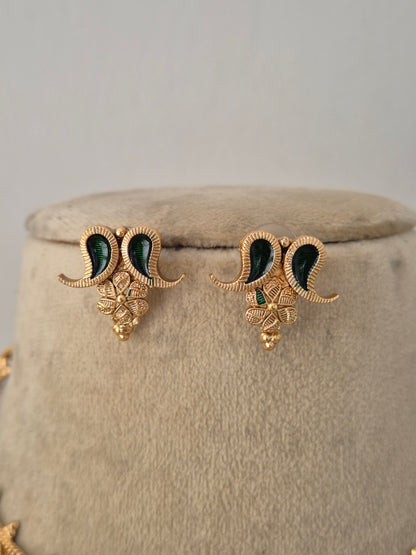 Traditional Indian ethnic gold and black bead necklace set with gemstone details by Naitri.in