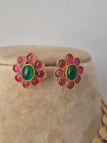 Gold-plated ethnic earring and a central emerald-green and ruby-pink  gemstone flower stud earrings by naitri.in
