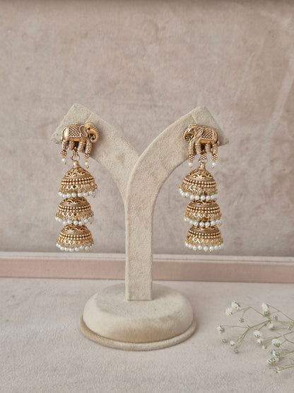 Anshi Earrings – Gold-plated traditional Indian temple drop earrings with pearl clusters and antique finish by naitri.in