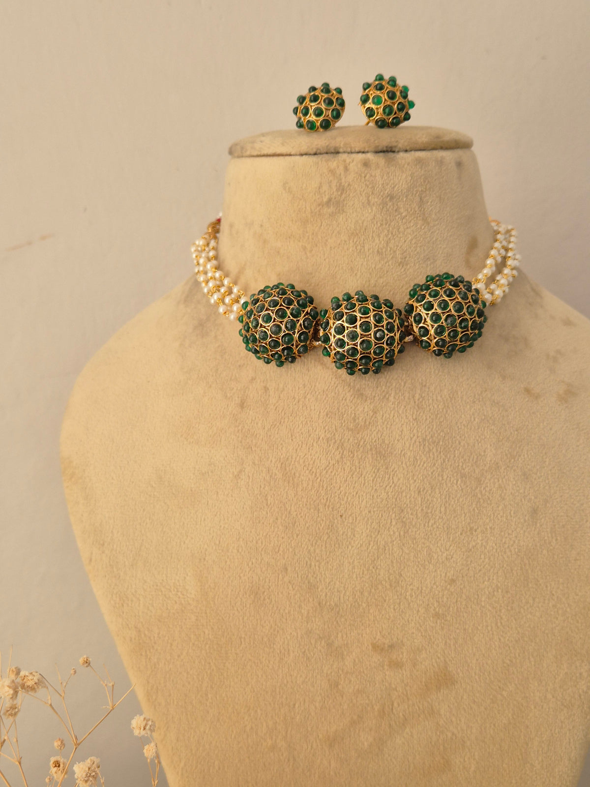 Traditional Indian ethnic gold and black bead necklace set with gemstone details by Naitri.in
