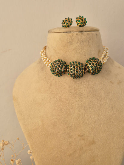 Traditional Indian ethnic gold and black bead necklace set with gemstone details by Naitri.in