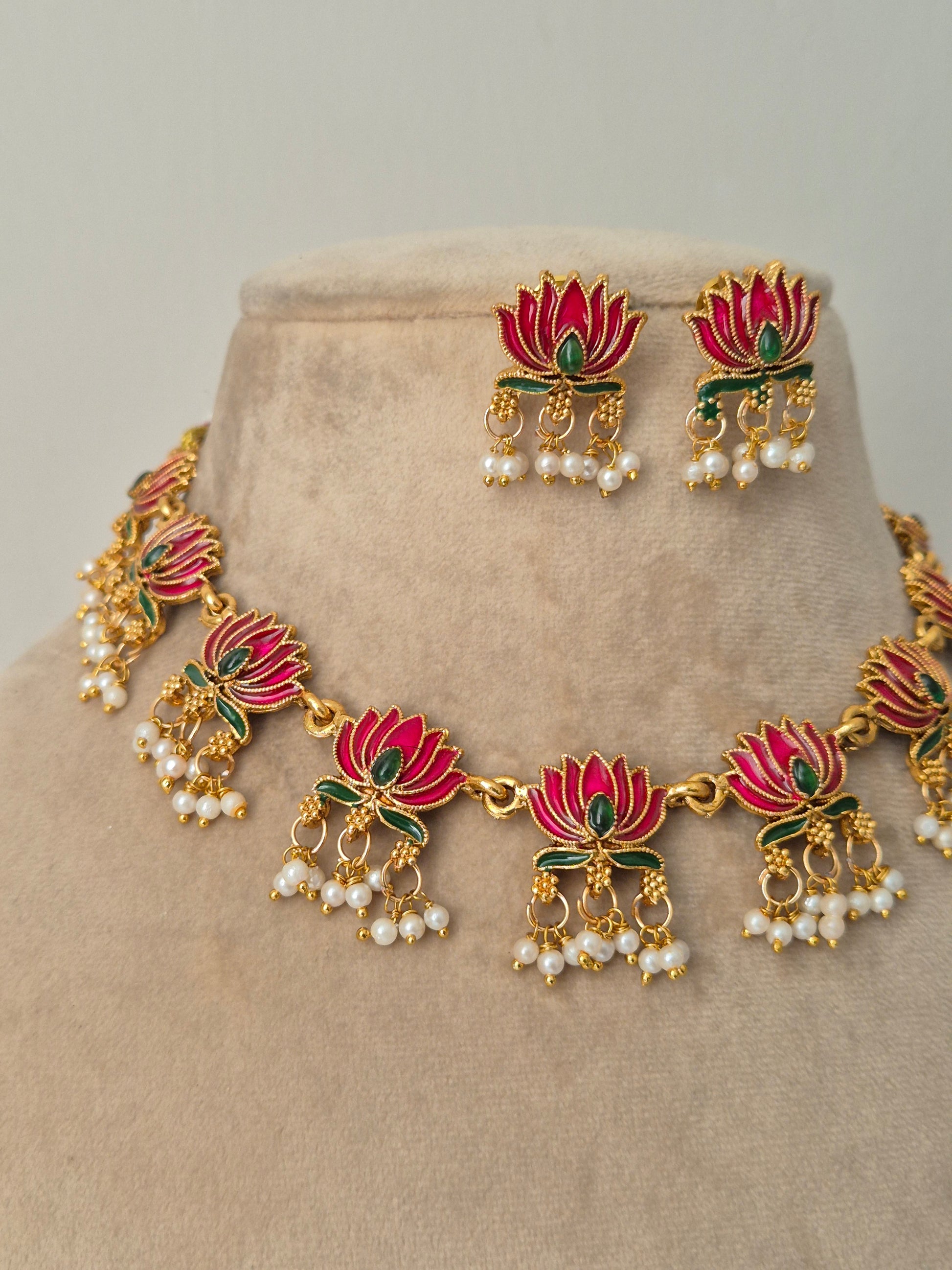 Ornate necklace with floral designs necklace set by naitri.in