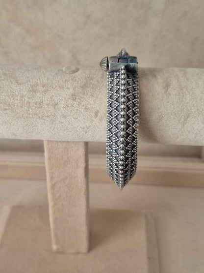 Elegant traditional style silver bangle bracelet by naitri.in