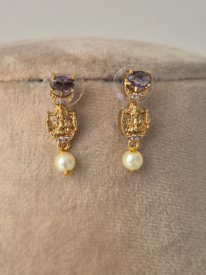purple stones hanging white pearls with goddess motifs earrings cute and attractive by naitri.in