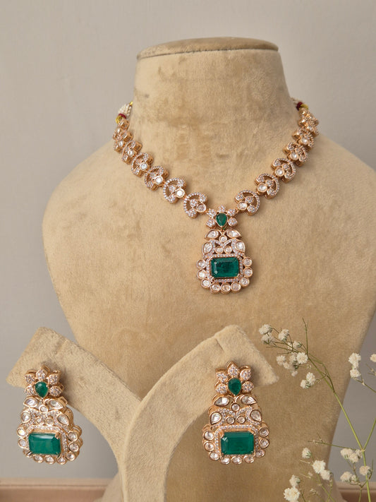 American Diamond Necklace Set with emerald green stones and gold-toned finish by Naitri.in