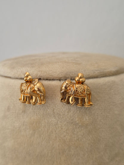 Gold elephant-shaped earrings by naitri.in