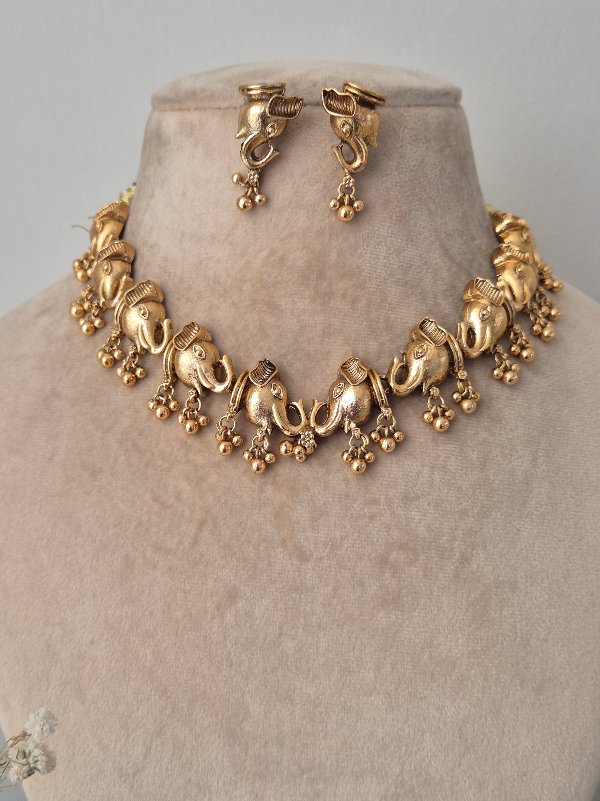 golden necklace with beautiful earrings, jewelry, necklace, elephant designed by naitri.in