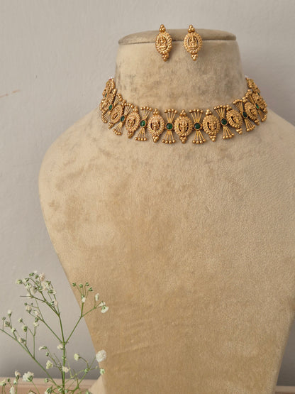 Gold-toned antique choker necklace and matching teardrop earrings, Antique gold-plated statement choker necklace and earring set paired by naitri.in