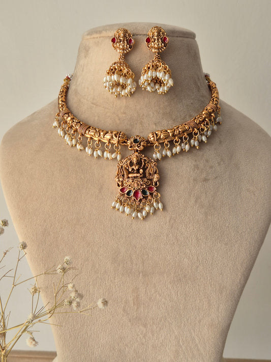 Gold necklace and earrings. Wearable art with incredible detail. Goddess Energy necklace by naitri.in