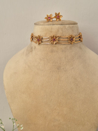 Elegant pink-red gemstone and gold-toned ethnic choker jewelry set, by naitri.in