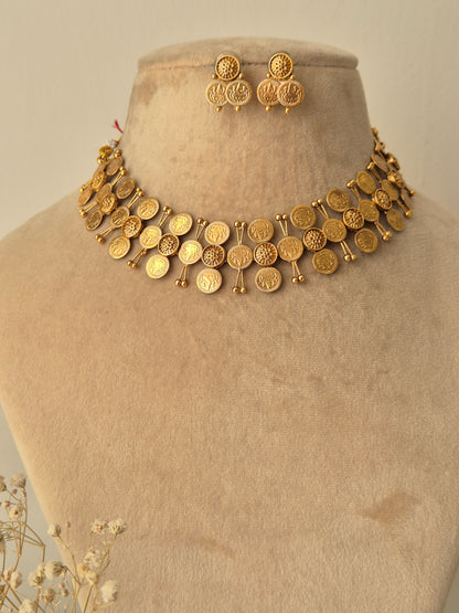 Handcrafted Pooja gold-tone choker set 3-layered dangling metallic coins, circular gold coin drops with matching ethnic earrings by naitri.in
