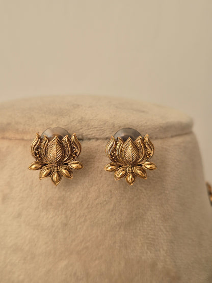 golden brass floral earring studs Artisanal Premium Jewellery by naitri.in