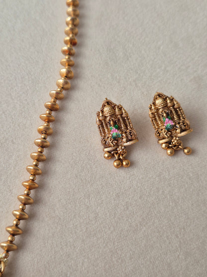 Golden Ethnic Earring with Temple Jewellery" and "Goddess motifs" modern Indian aesthetic by naitri.in
