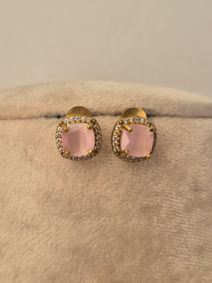 Delicate gold earrings e with a blush pink stone pendan tsurrounded by small crystals, by naitri.in