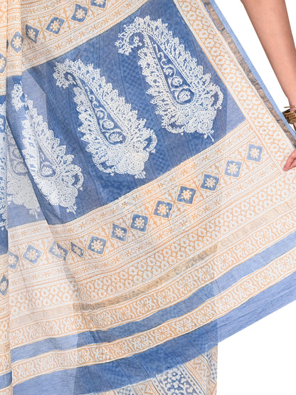 Detailed view of traditional Bagh hand block printing on a beige and blue Maheshwari cotton silk saree featuring a classic drape By naitri.in