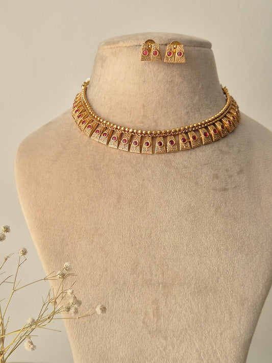 Gold necklace with red stones necklace traditional design by naitri.in