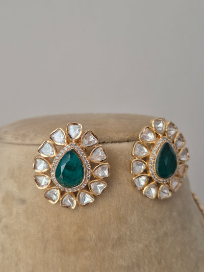 earrings with emerald-green centers  from the Naitri handcrafted collection.