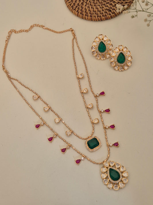 Handcrafted alloy necklace set with shimmering American Diamonds, featuring a dual-strand design with vibrant green and pink gemstone droplets by naitri.in