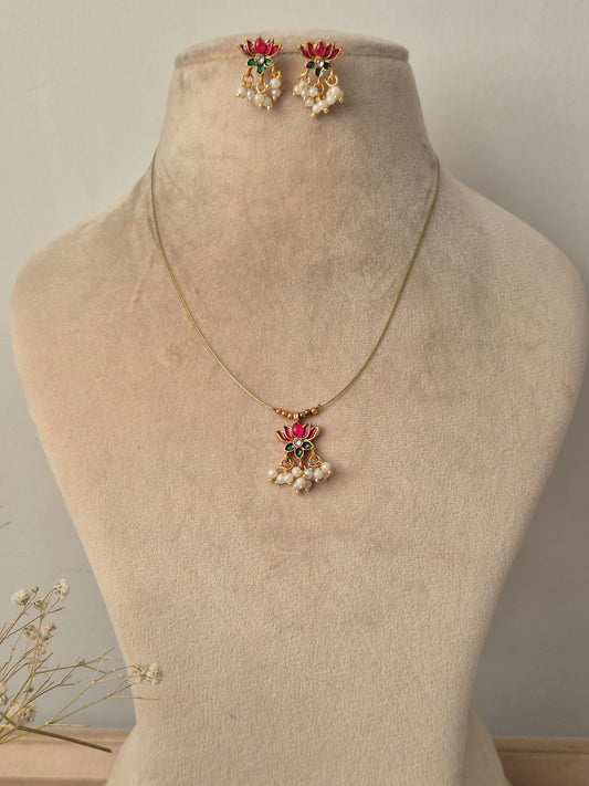 Necklace with pink lotus  design invisible chain light weight elegant and minimal jewellery set by naitri