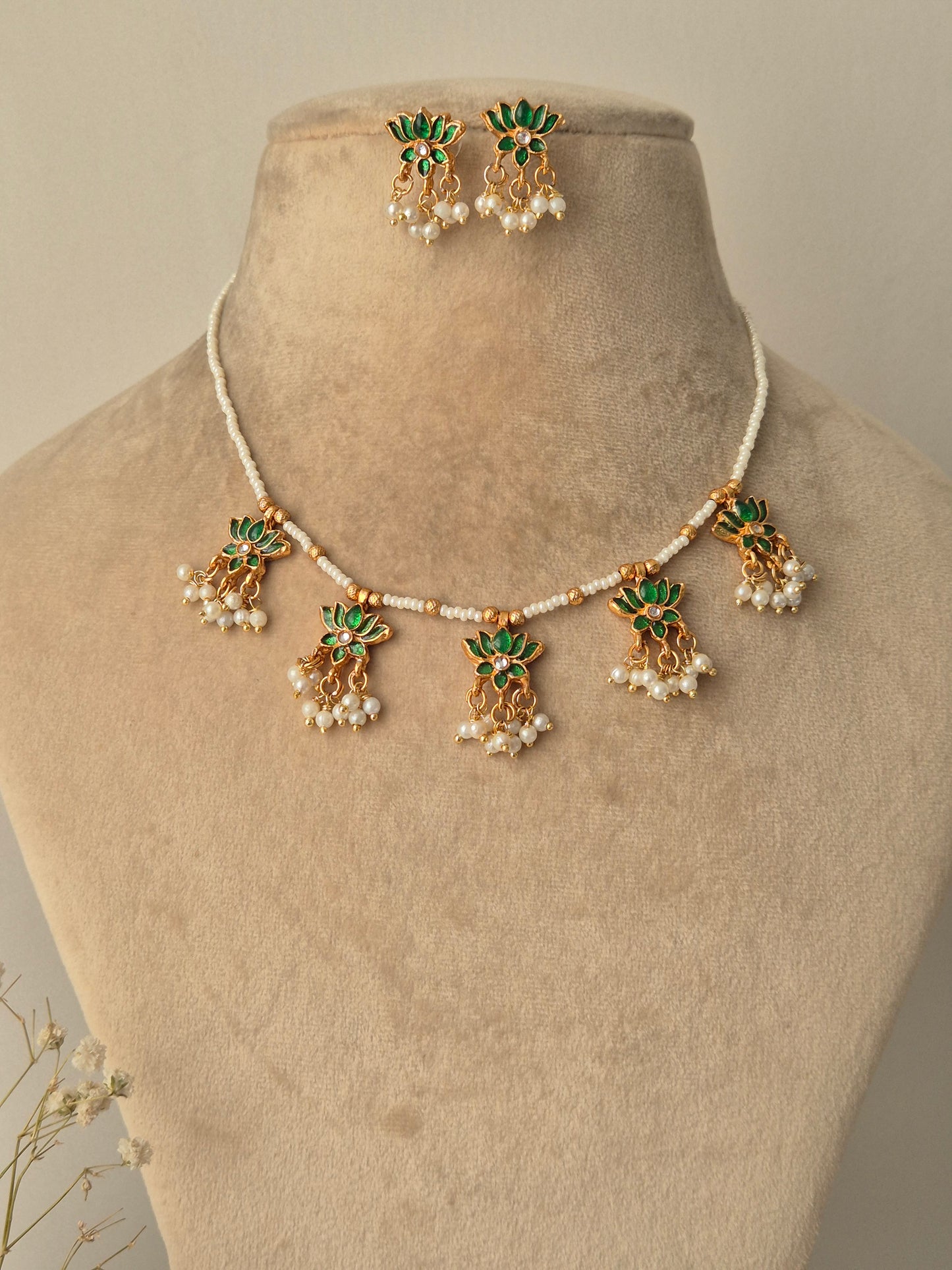 Decorative neckpiece with green and gold elements everyday luxury by naitri.in