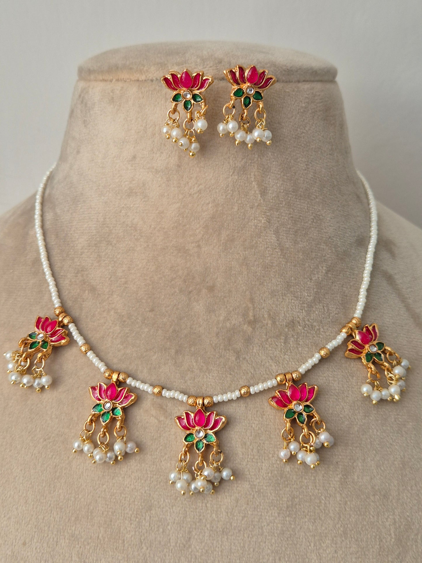 Decorative neckpiece with pink-green and gold elements everyday luxury by naitri.in