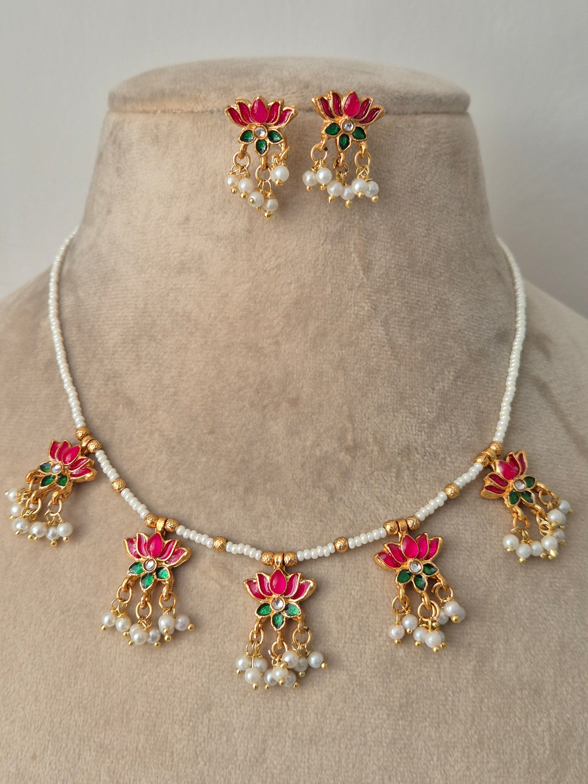 Decorative neckpiece with pink-green and gold elements everyday luxury by naitri.in