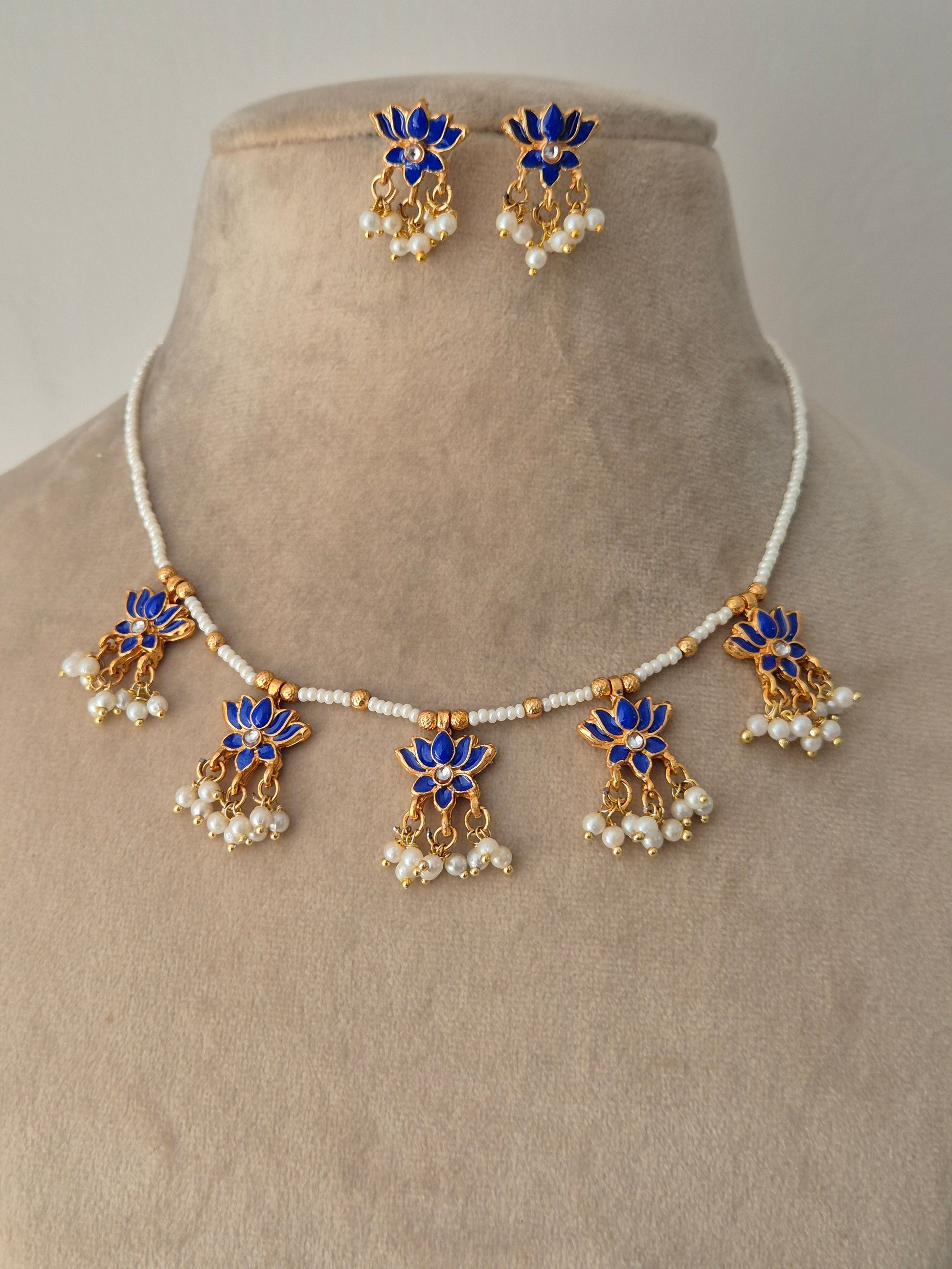 Decorative neckpiece with blue and gold elements everyday luxury by naitri.in