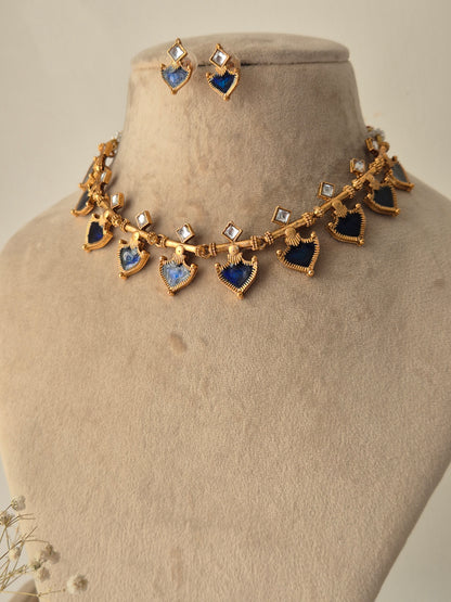 Fiya necklace and earring set with blue coloured and clear square shaped stone by naitri.in