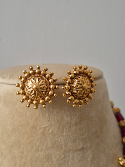 gold-toned and circular stud earrings by naitri.in