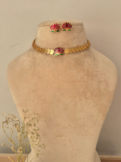 Gold-tone ethnic choker necklace set with lotus flower motif and matching stud earring by naitri.in