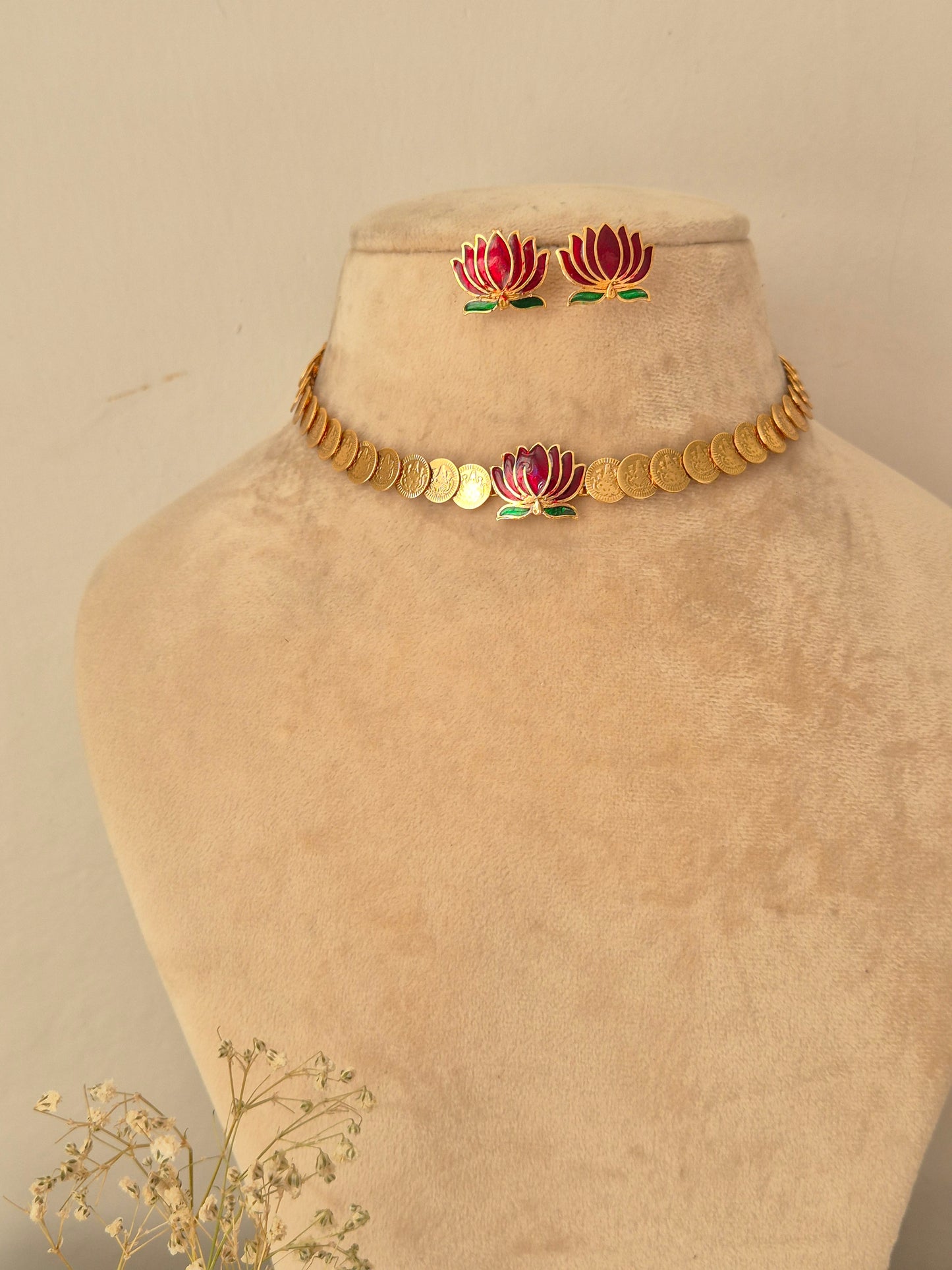 traditional brass alloy gold-tone choker necklace and lotus flower studs with pink and green enamel detailing by naitri.in