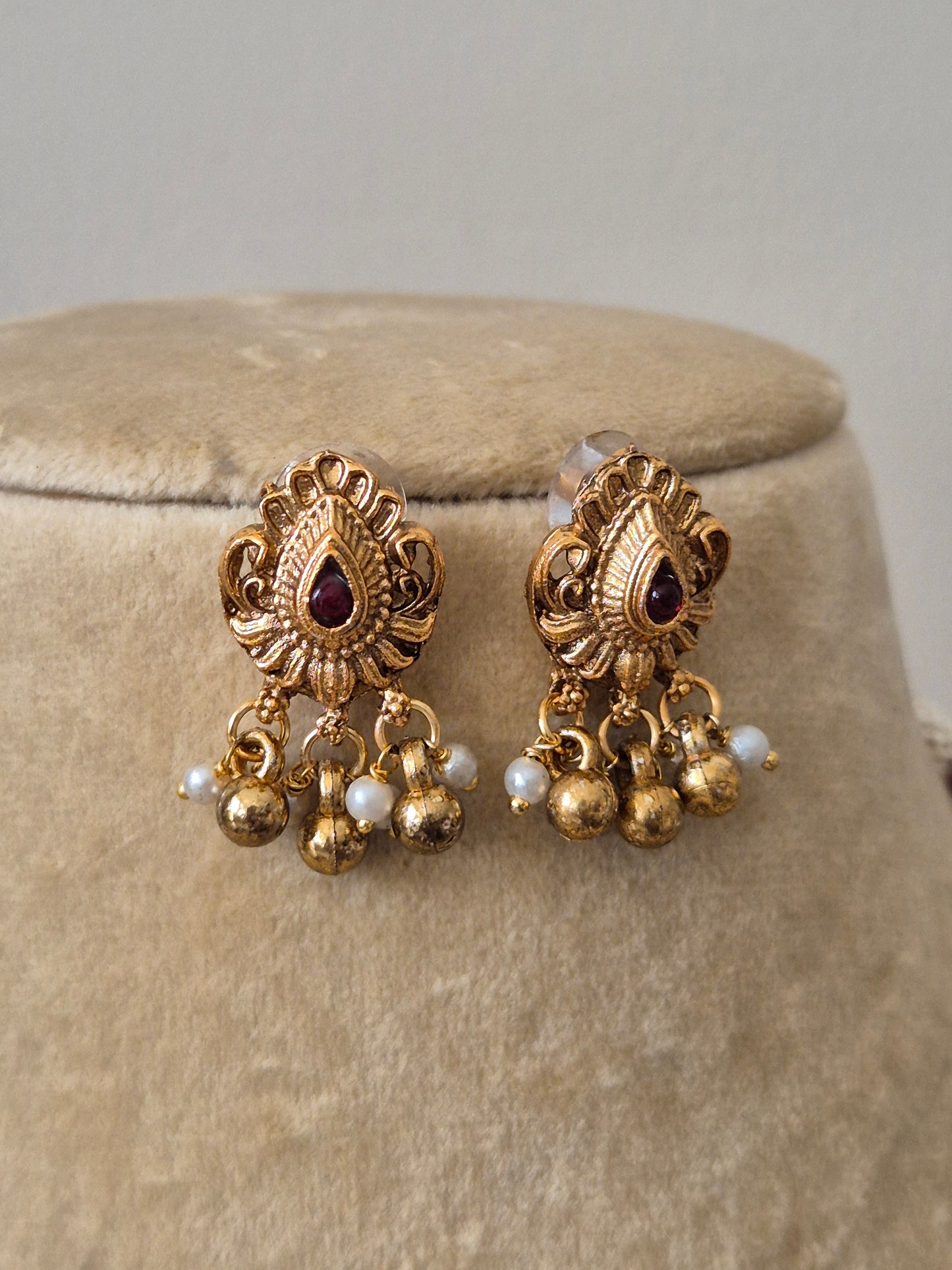 Antique Gold-Finish Jewellery with Pink Stones and gold-pearls Hangings for Traditional Occasions by naitri.in