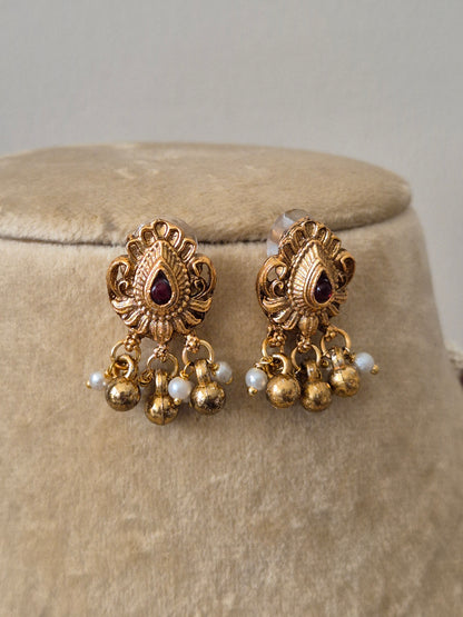 Antique Gold-Finish Jewellery with Pink Stones and gold-pearls Hangings for Traditional Occasions by naitri.in