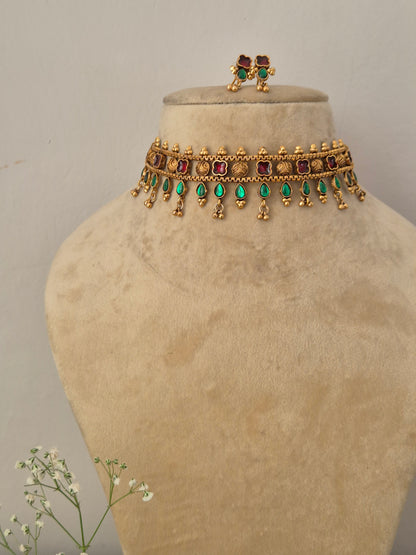  Elegant multi-colored gemstone and gold-toned ethnic choker jewelry set by naitri.in 