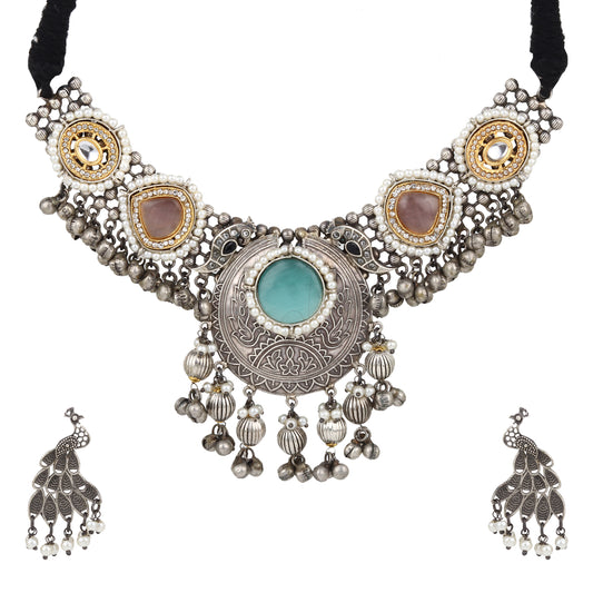 Multicolor beaded necklace set, Rangkriti by Naitri, on white display.